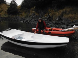 Mary Owen helps splash Scarlet, and her hull is wet for the first time.