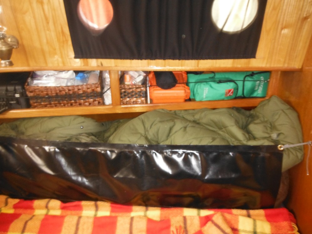 Behind the gear cloth lies the medical emergency shelf.  We have a well prepared medical emergency system.  Thanks to the expertise of onboard Medic.  Will Watson. 