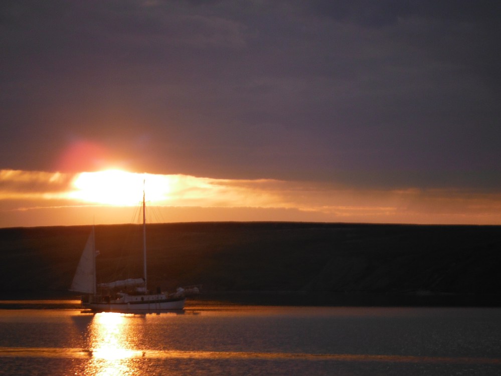 Empiricus, on anchor in Pauline Cove, Hershel Island.  Where 120 year old shipwreck pieces still wash up on shore.