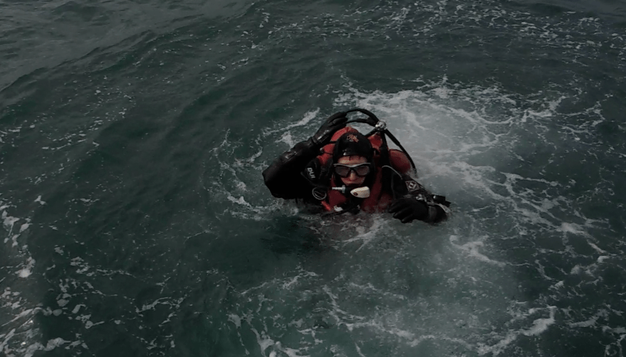 Giving the "IM OK" to Samantha before descending.