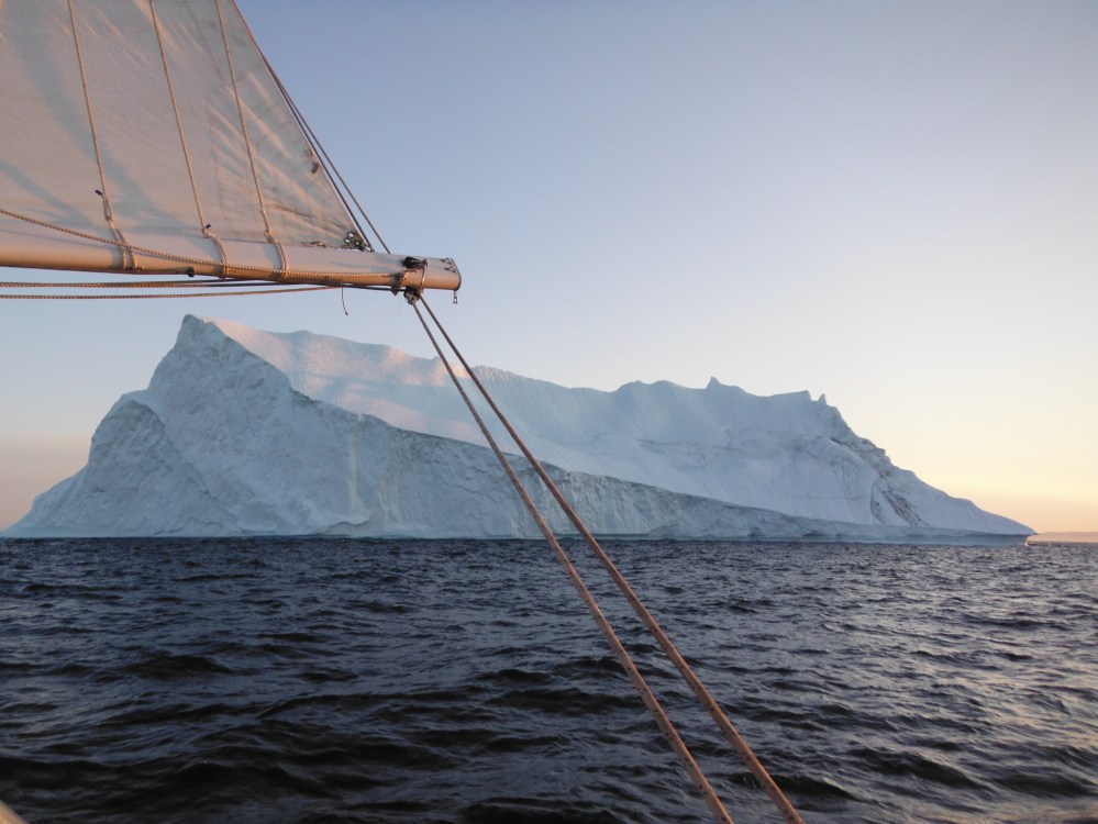 Sailing amongst floating ice mountains in Disko Bay Greenland